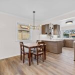 Bright, modern kitchen and dining area in an Affordable Living Company shared housing home in Hammond, Indiana