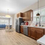 Open kitchen and dining area in an Affordable Living Company shared housing home
