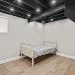 Private bedroom with a single bed in an Affordable Living Company shared housing home
