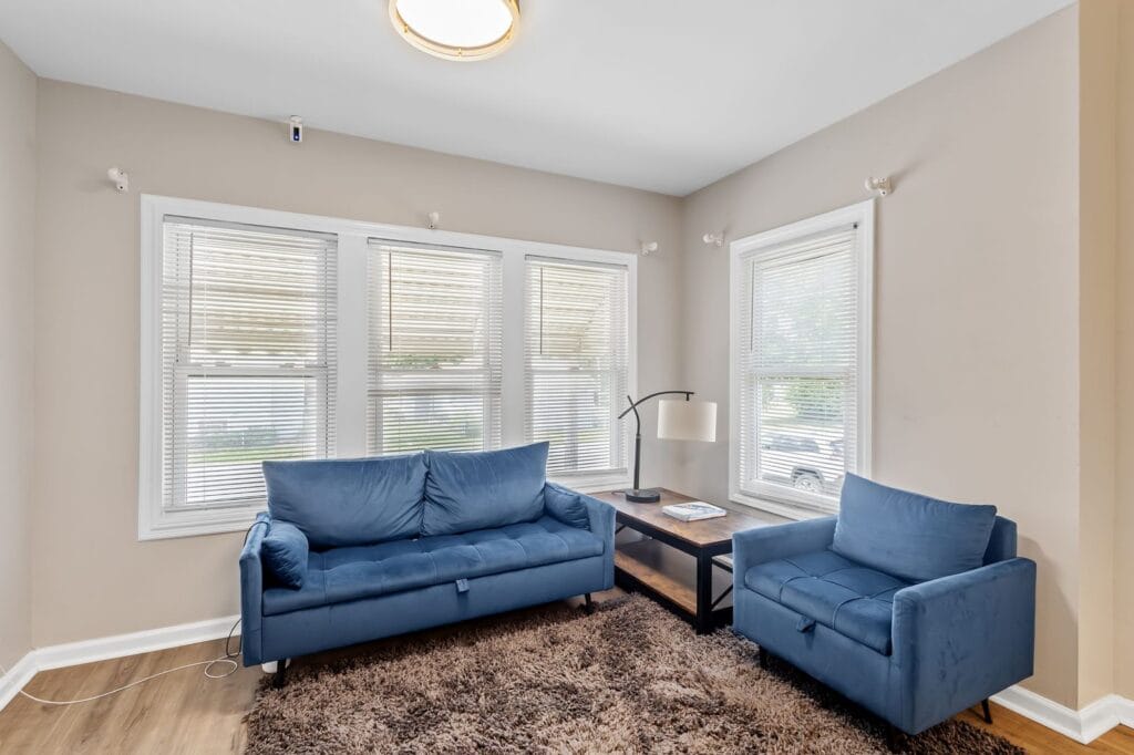 Shared living room for rooms for rent near Schererville, Indiana